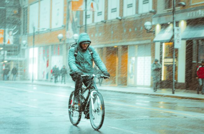 How cyclists respond to bad weather: Lessons learnt from 100 million rides