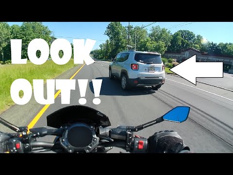 Jeep lady cuts into my lane even though her lane is wide open!