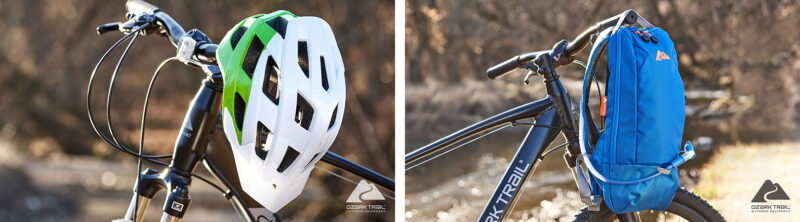 ozark trail bicycle helmet and hydration pack hanging from handlebars