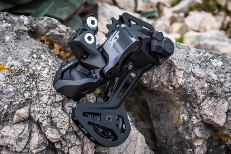 Next-gen Shimano eMTB ebikes transformed with AutoShift FreeShift automatic shifting, powered by LinkGlide, EP-801 & 11sp XT Di2, photo by Dan Milner