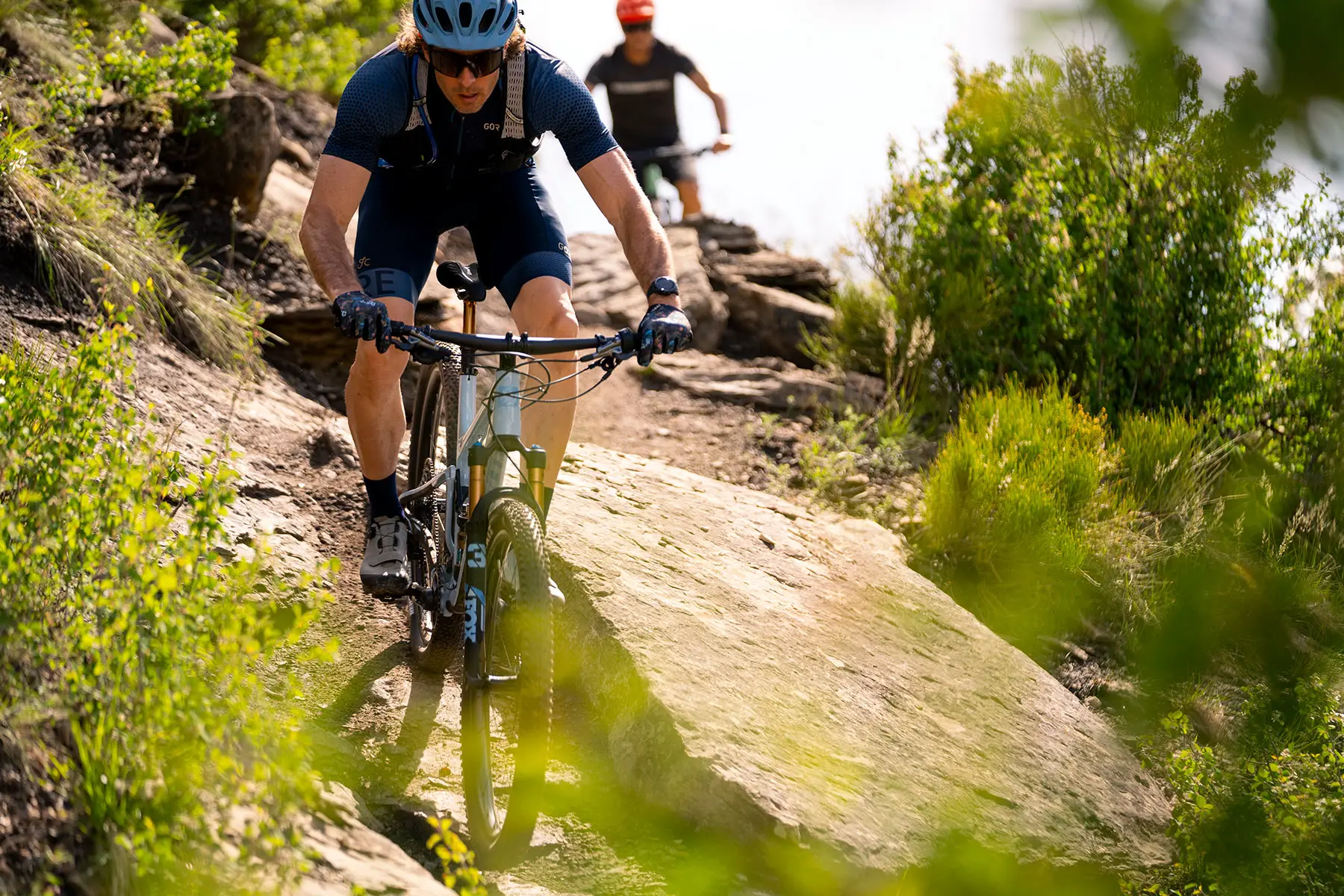 riding action of pivot mach 4SL xc mountain bike