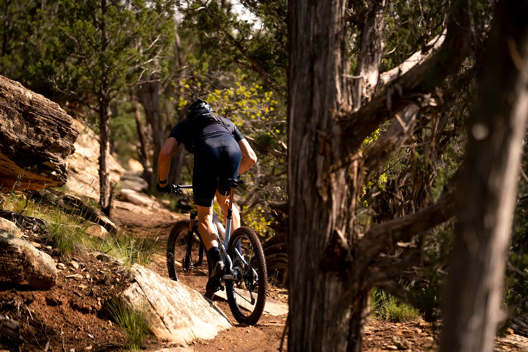 riding action of pivot mach 4SL xc mountain bike