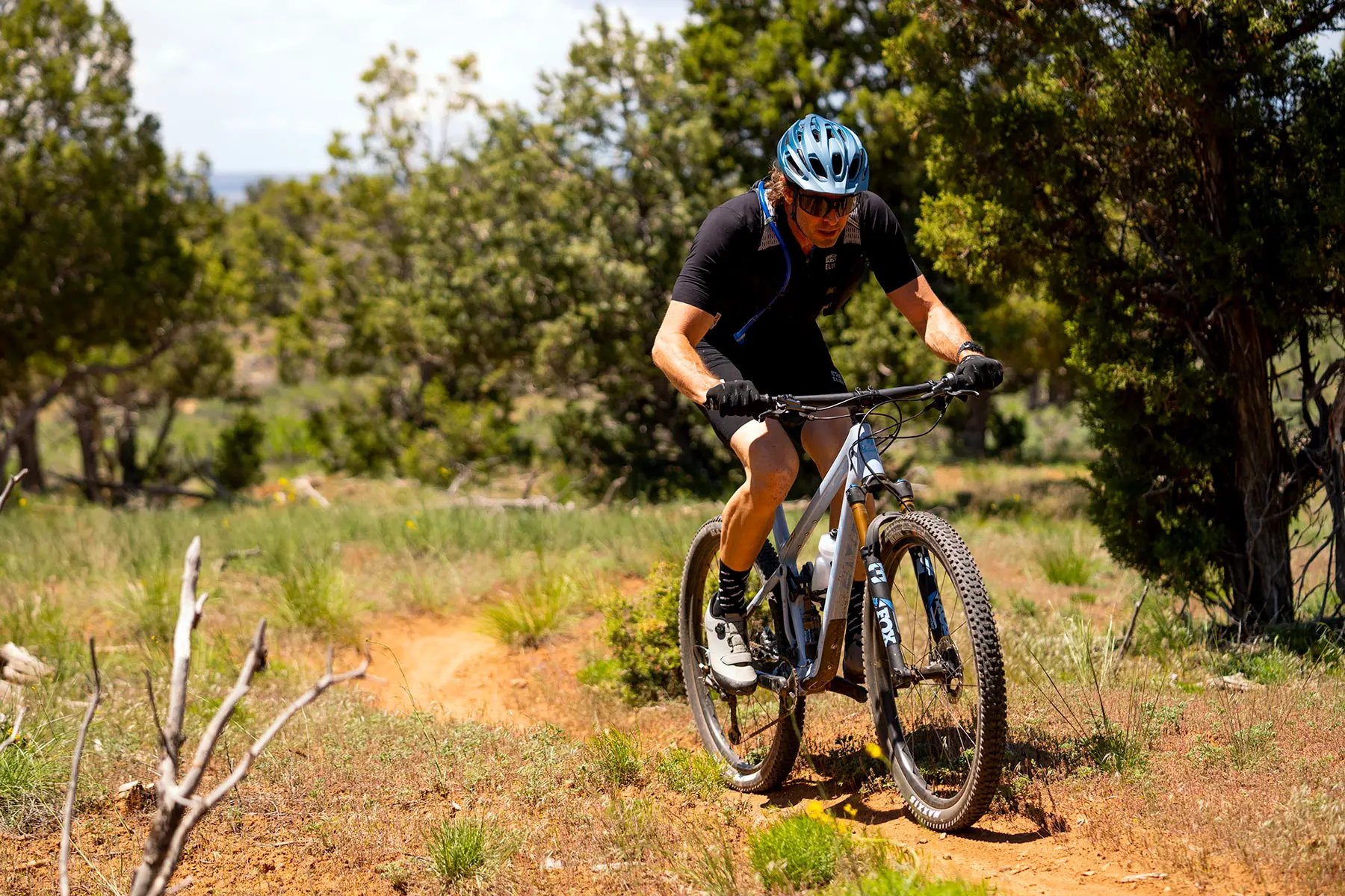 riding action of pivot mach 4SL xc mountain bike