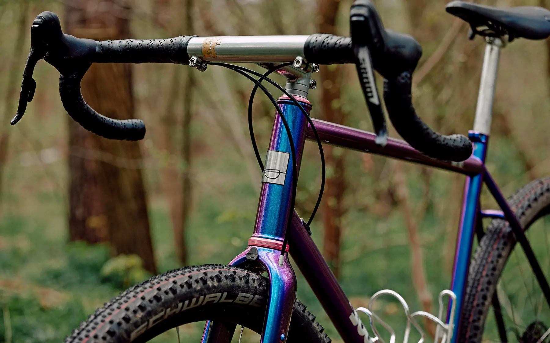 Sour Business ultra-tough carbon gravel adventure bikepacking fork, custom Purple Haze photo by Flori, Brainfart Industries wide gravel bar