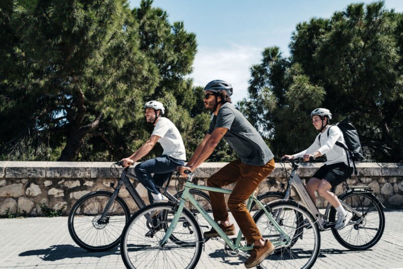 cyclists riding schwalbe green maratjon eco friendly recycled bicycle tire