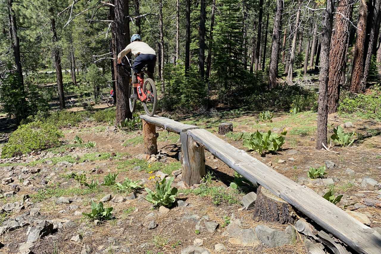 Hitting a feature while testing the Shimano ME7 mountain bike shoes