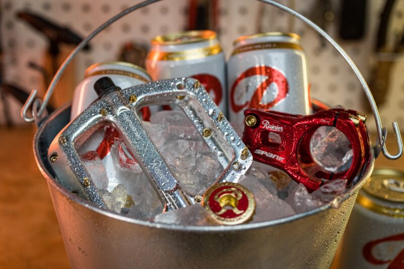 Spank x Rainier collab bucket o' beer and bike parts